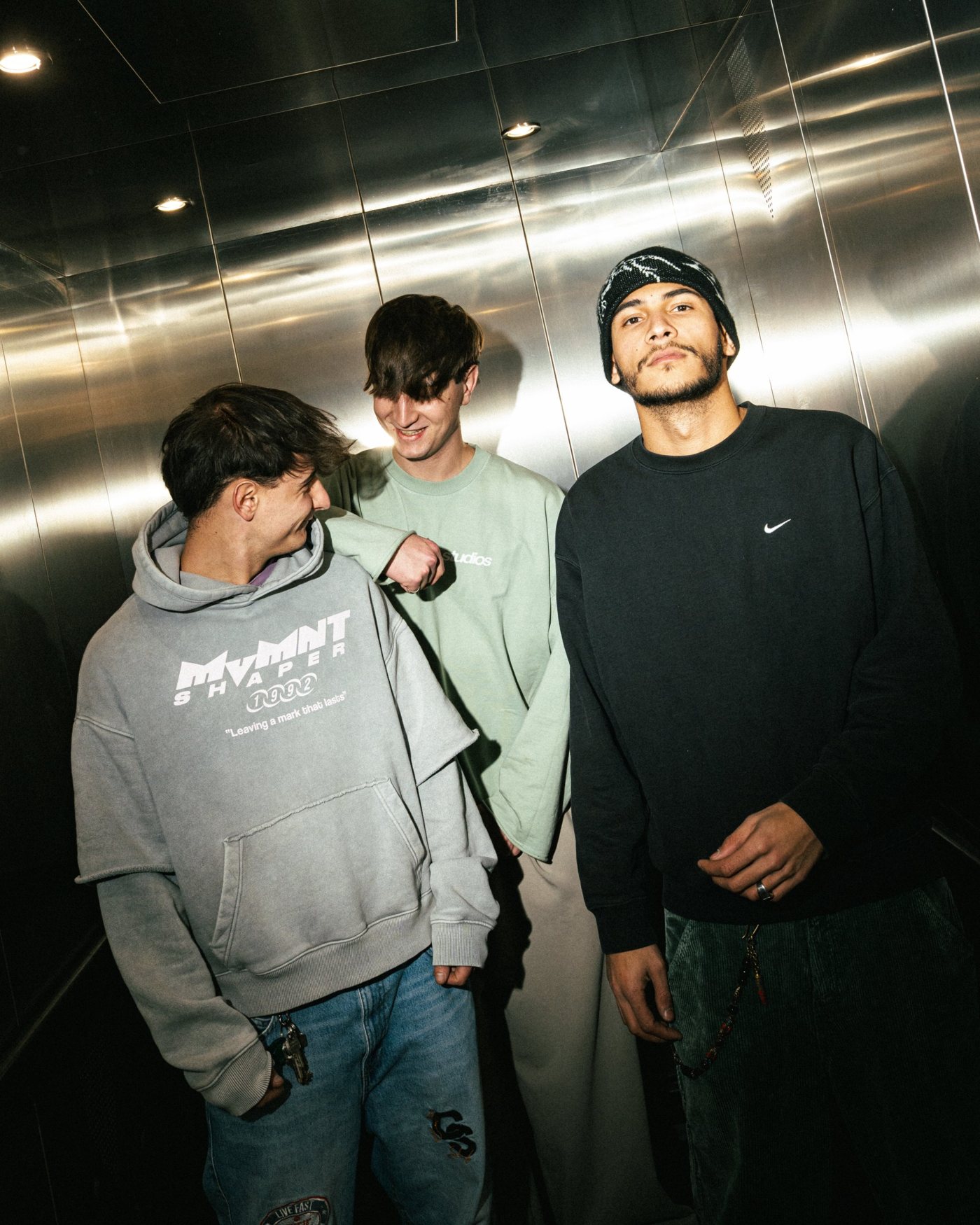 Loco, Jacob Safari and Ghila in a steel lift
